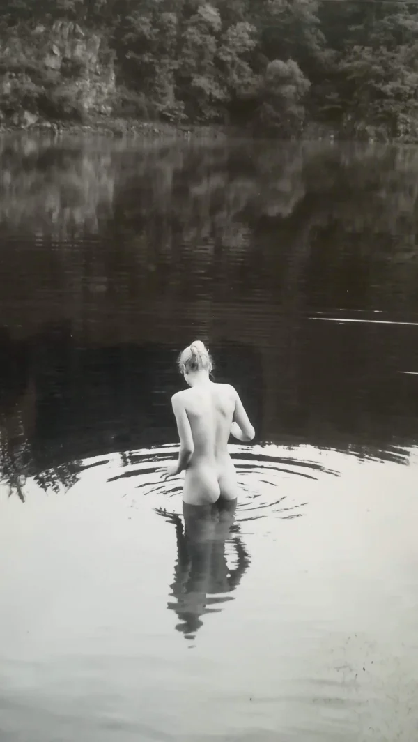 Girl Taking A Bath In A Lake