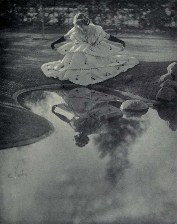 girl-reflecting-in-water female