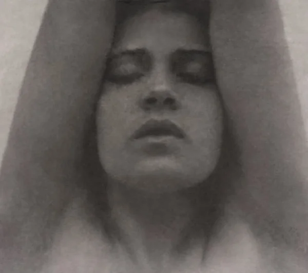 tina-modotti-with-arms-raised female