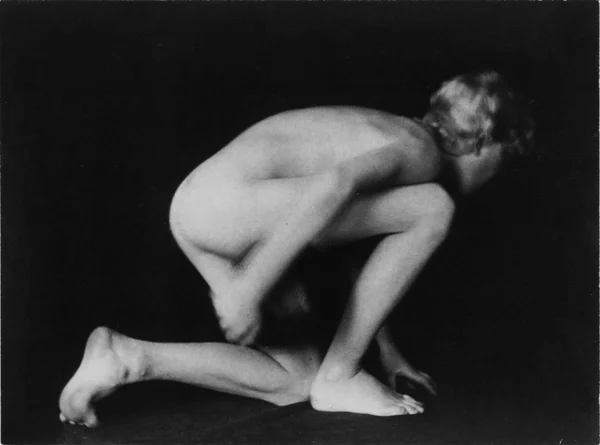 nude-boy-studio-crouching-profile male
