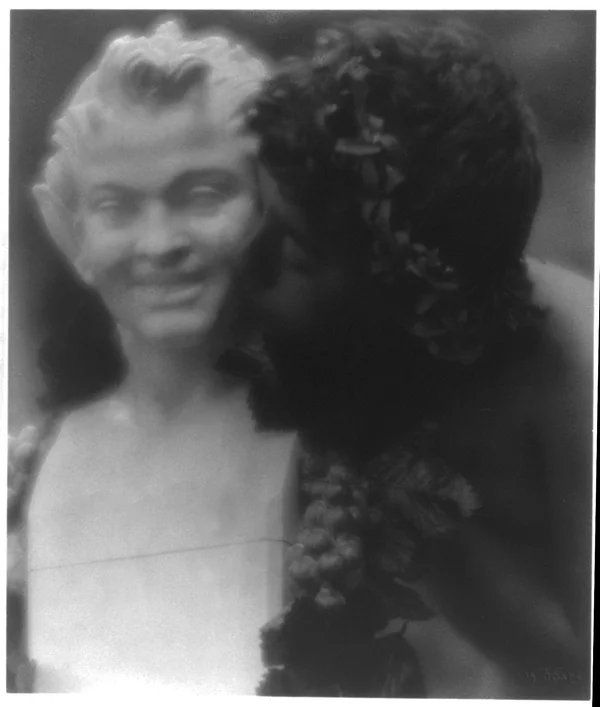 nude-youth-laurel-wreath-kissing-herm-pan male