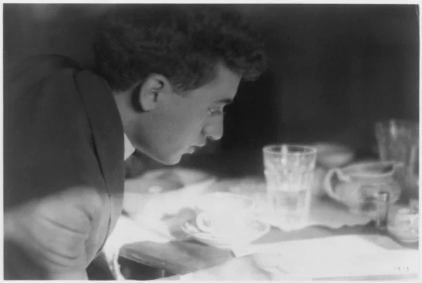 pucky-suit-reading-newspaper-kitchen-table male