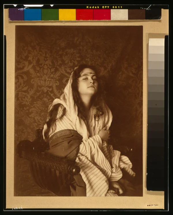 young-woman-nancy-lovis-kraft-middle-eastern-costume-jeweled-headband-seated female