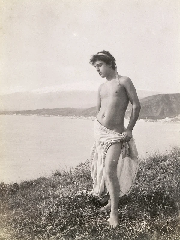 pasquale-on-a-field-with-grass-over-the-sea male