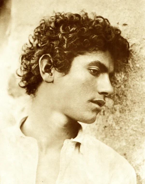 profile-curly-youth male