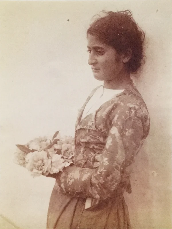 sicilian-woman-posing-with-flowers female