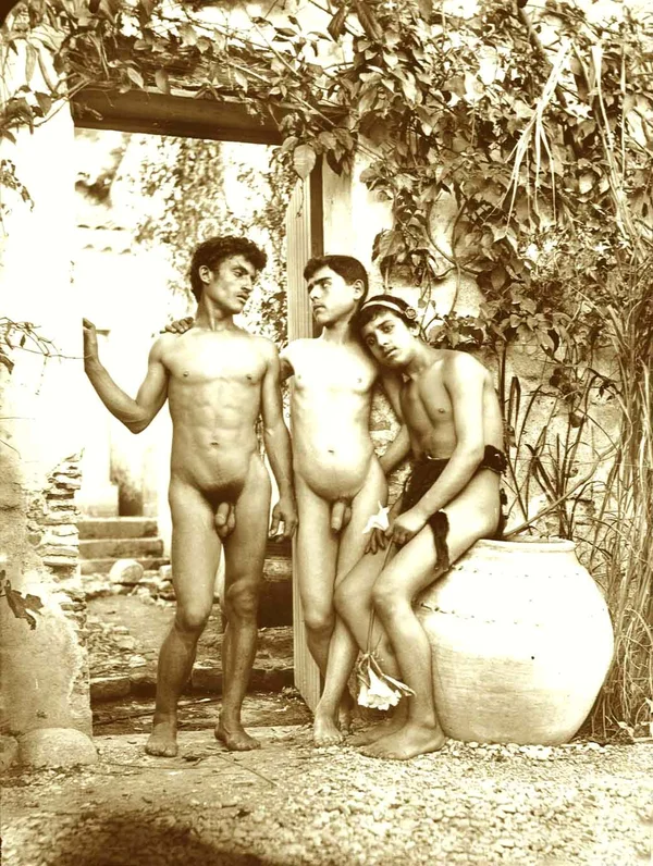 three-youths-naked-by-open-door male