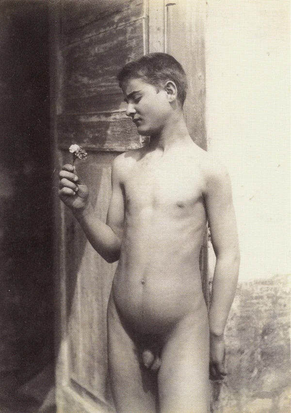 nude-boy-standing-by-door-holding-flower-villa-barbaja-naples male
