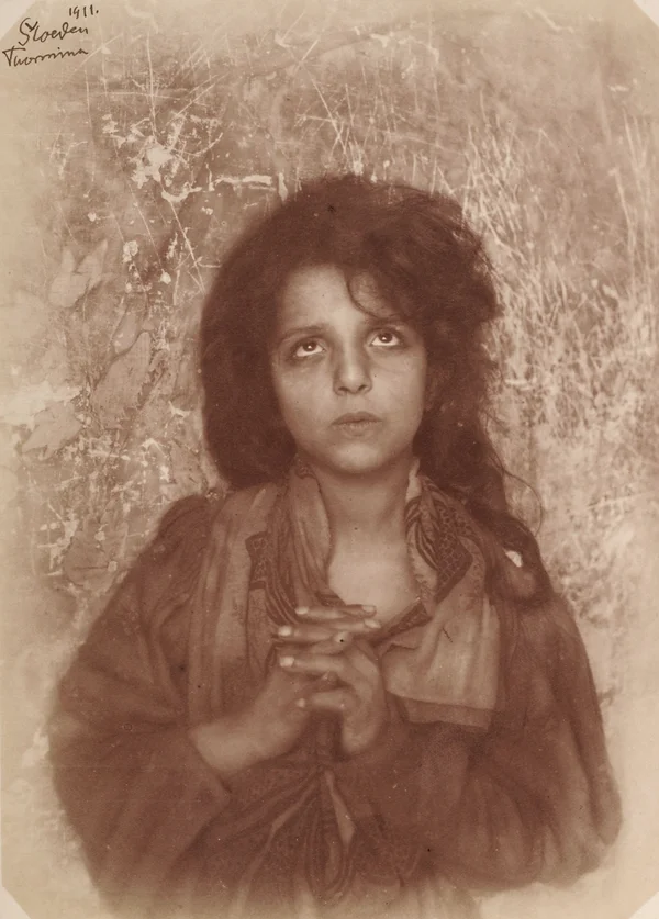 praying-boy-in-female-dress male