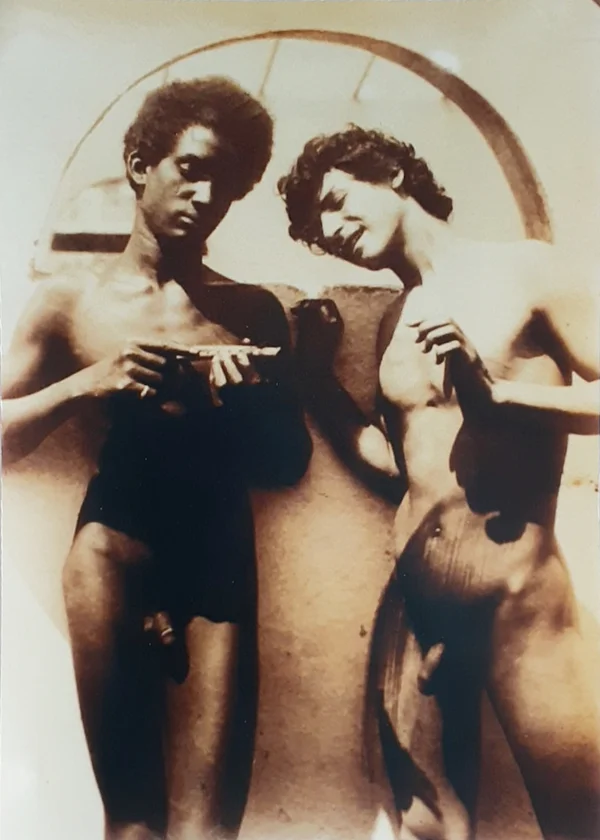 black-youth-showing-pipe-to-white-youth male
