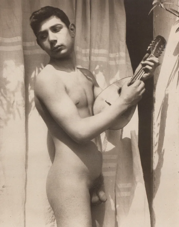 boy-holding-mandolin male