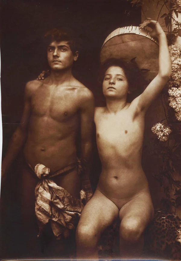 draped-youth-standing-by-sitting-girl-with-tambourine mixed-genders
