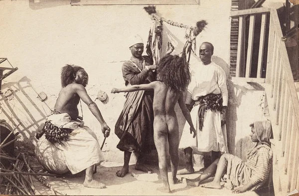 group-of-people-from-africa-playing-and-dancing mixed-genders