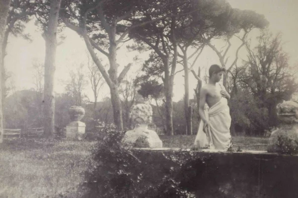 half-clad-boy-in-garden-castello-chigi-castel-fusano male