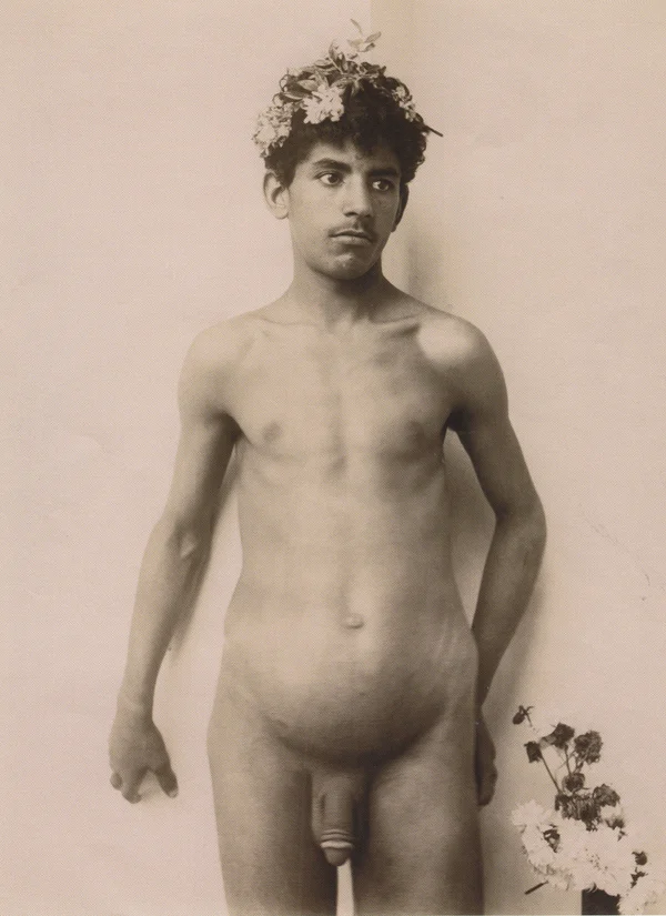 naked-boy-wearing-flowergarland-in-algeria male