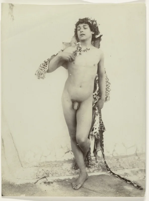 naked-youth-wearing-leopard-skin male