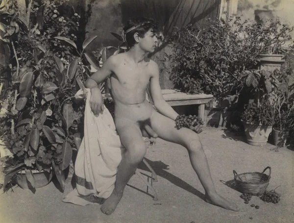 nude-boy-holding-grapes-sitting-on-bench-villa-barbaja-naples male