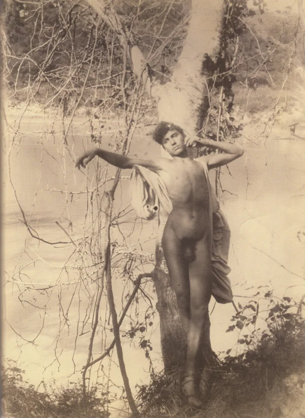 nude-boy-leaning-on-tree male