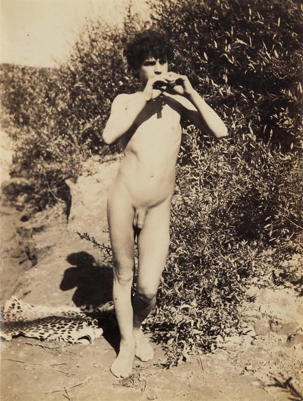 nude-boy-playing-flute-countryside male