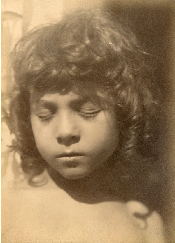 portrait-of-boy-with-long-hair-and-closed-eyes male
