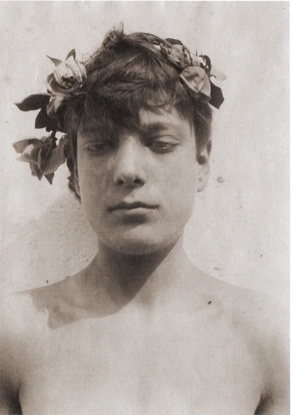 portrait-of-youth-wearing-rose-wreath male