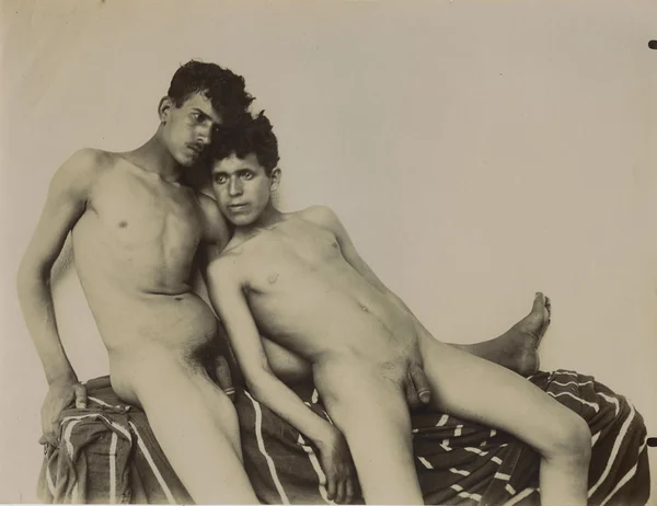 two-naked-algerian-youths-sitting-close male