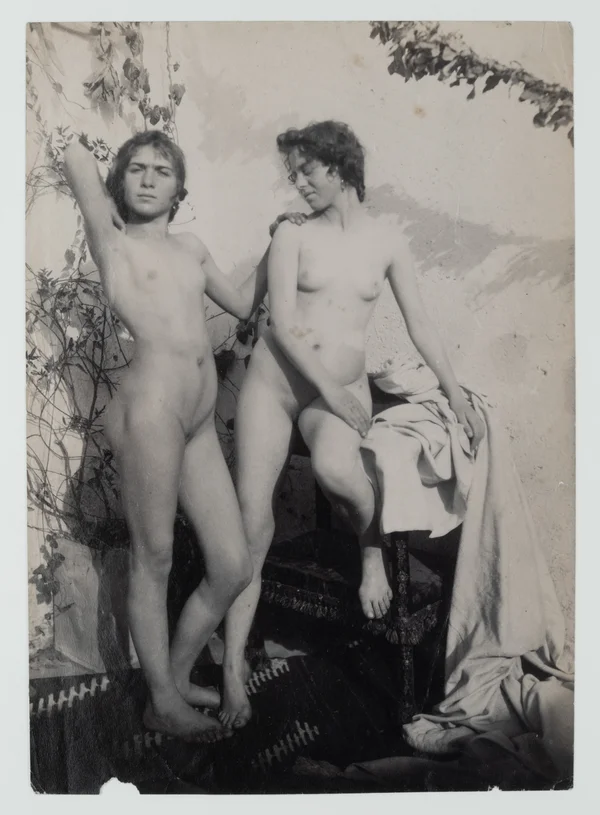 two-women-standing-by-stool female