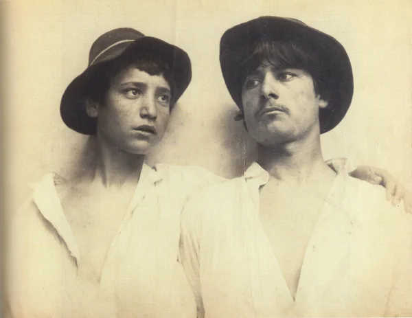 two-youths-wearing-hats male